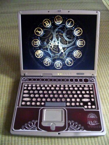 The Kowal Portable Typewriter and Adding Machine - Steampunkification of a Laptop with stickers